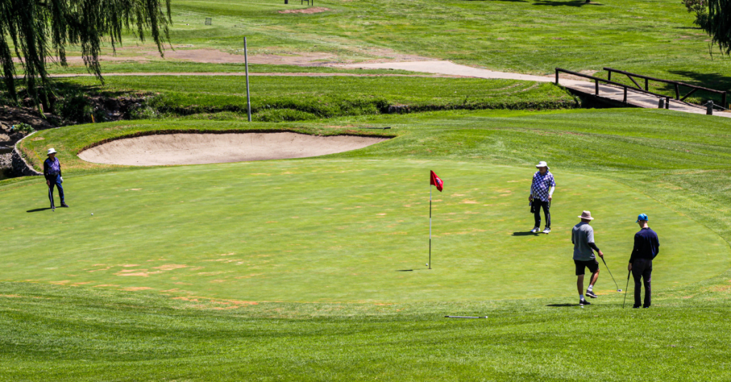 Visitors relaxing and enjoying sunshine on our golf course greens